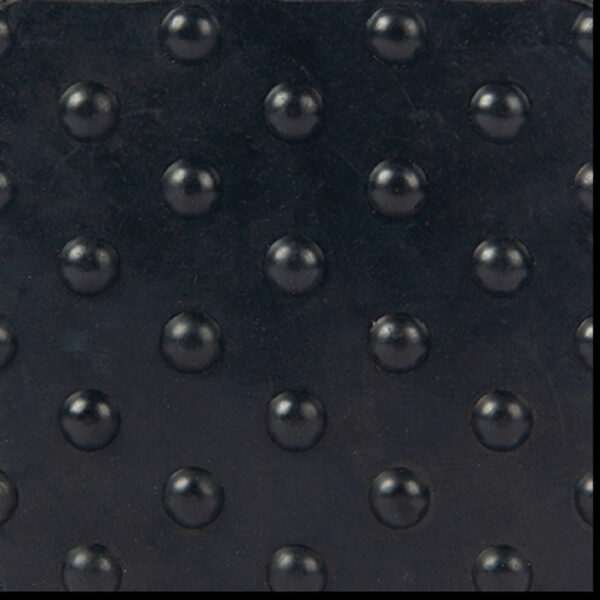 Black textured rubber mat.