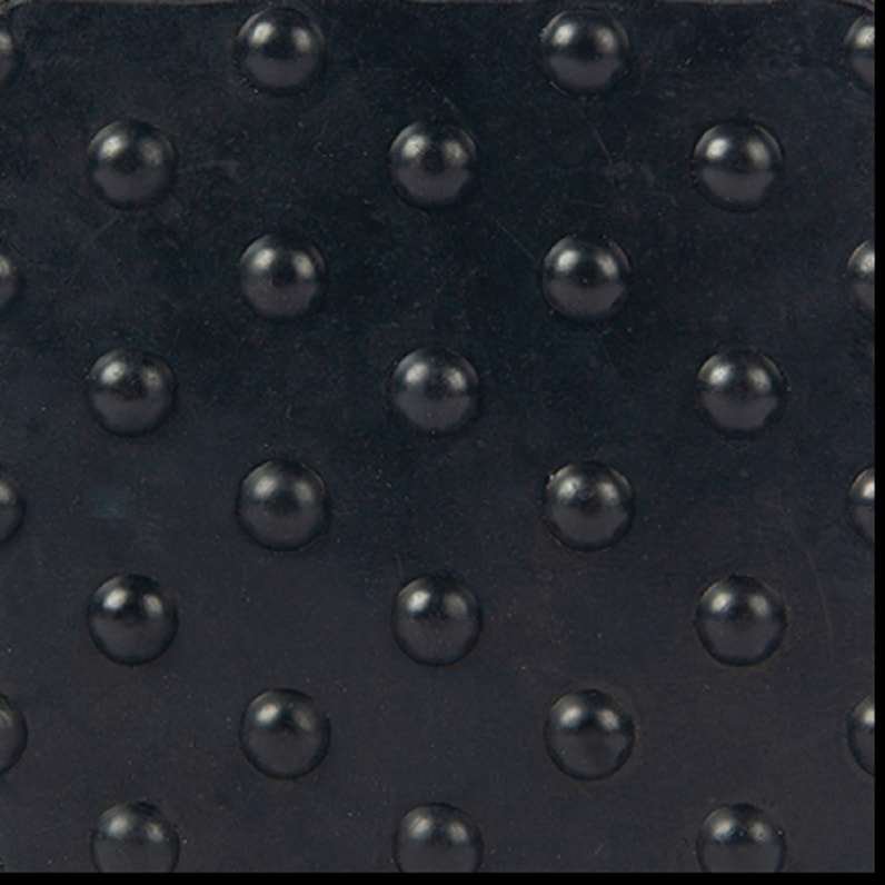 Black textured rubber mat.